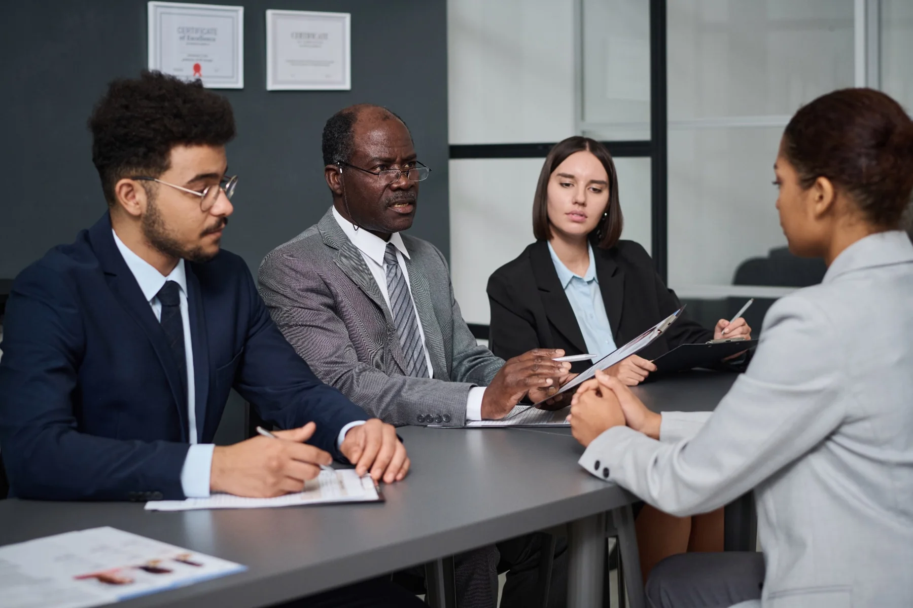 Immigration professionals reviewing an applicant profile